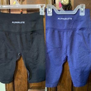 Alphalete Bundle of 2 blue and black biker shorts
